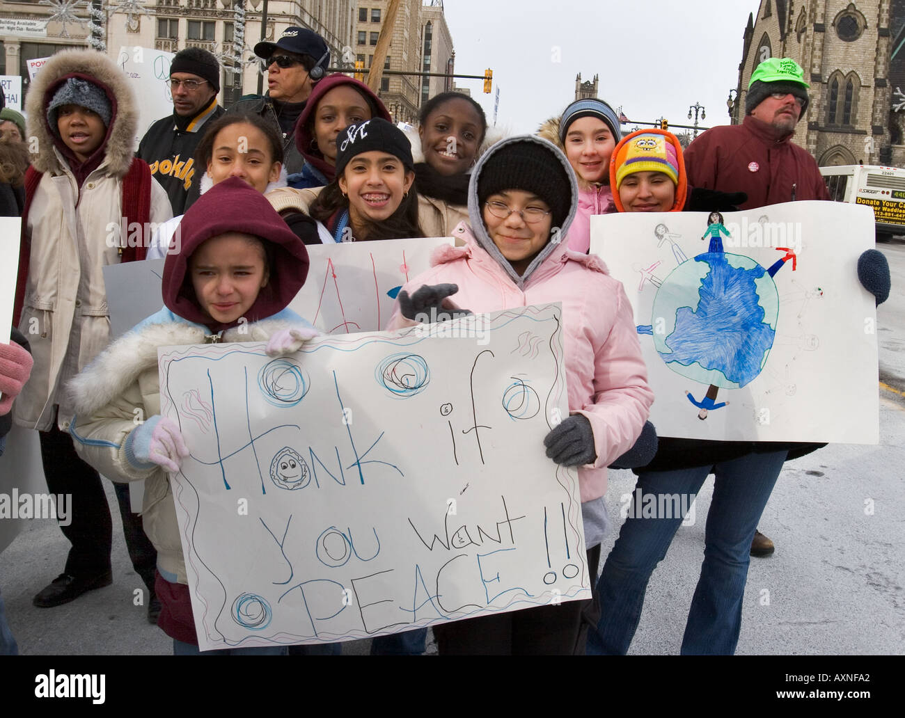 Persone Opporsi alla guerra in Iraq durante il Martin Luther King Jr Day a Detroit Foto Stock