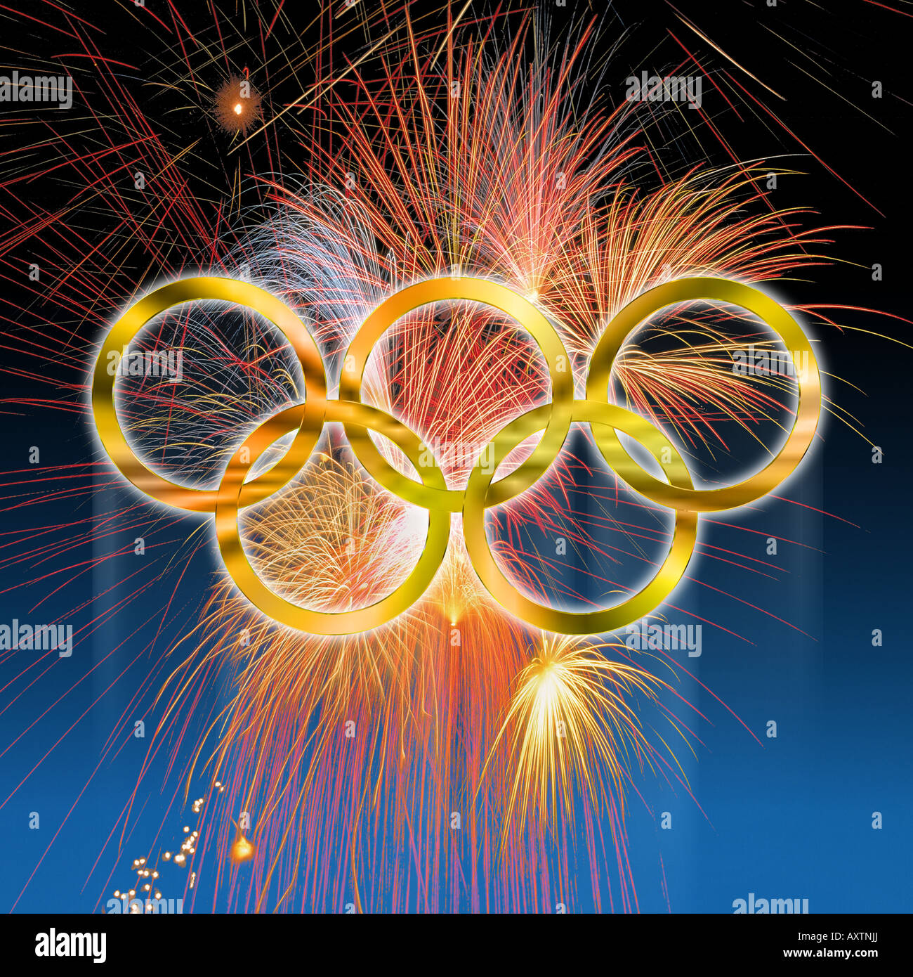 Golden anelli olimpici contro fuochi d'artificio su blu profondo sfondo graduate Foto Stock