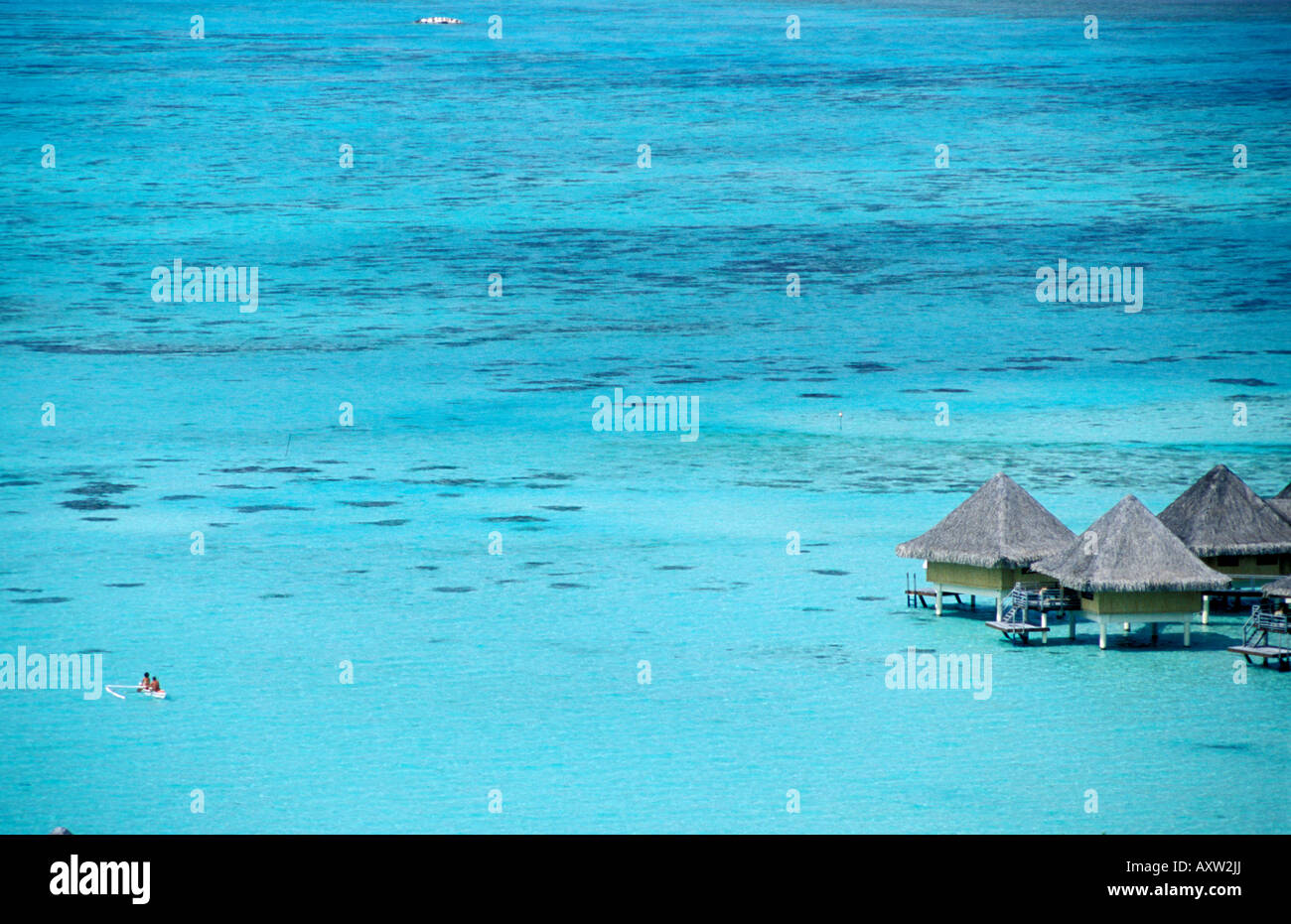 Water Bungalows su palafitte del Beachcomber Hotel Bora Bora Isole della Società Polinesia Francese Foto Stock