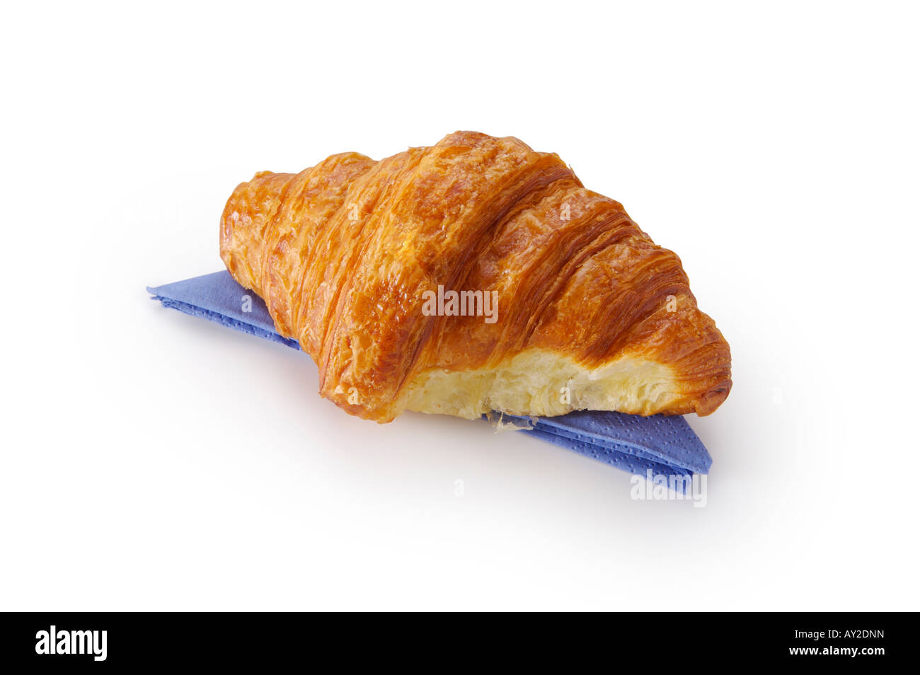 Croissant sul tovagliolo blu cut-out Foto Stock