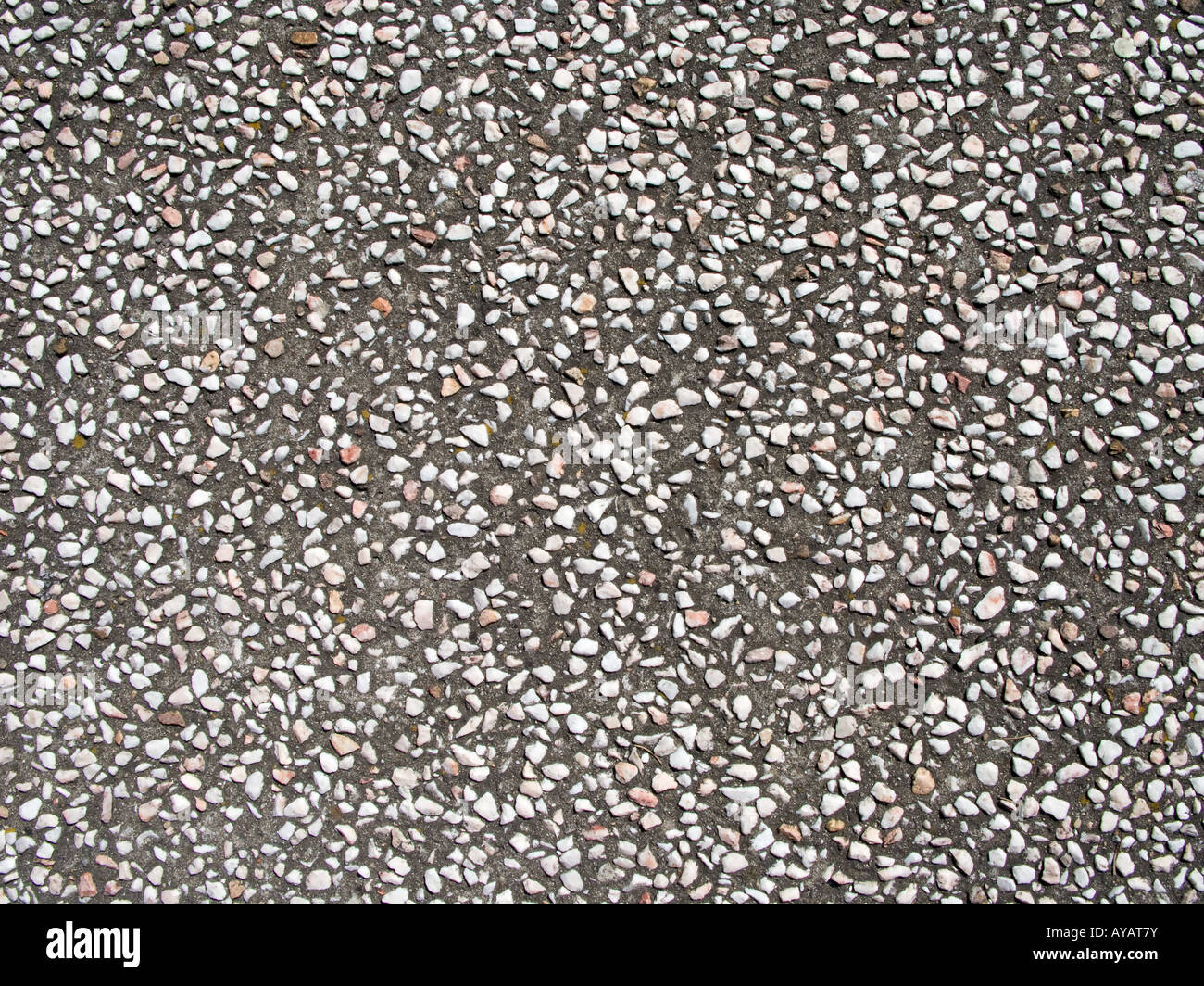Pavimentazione di asfalto e ghiaia Foto Stock