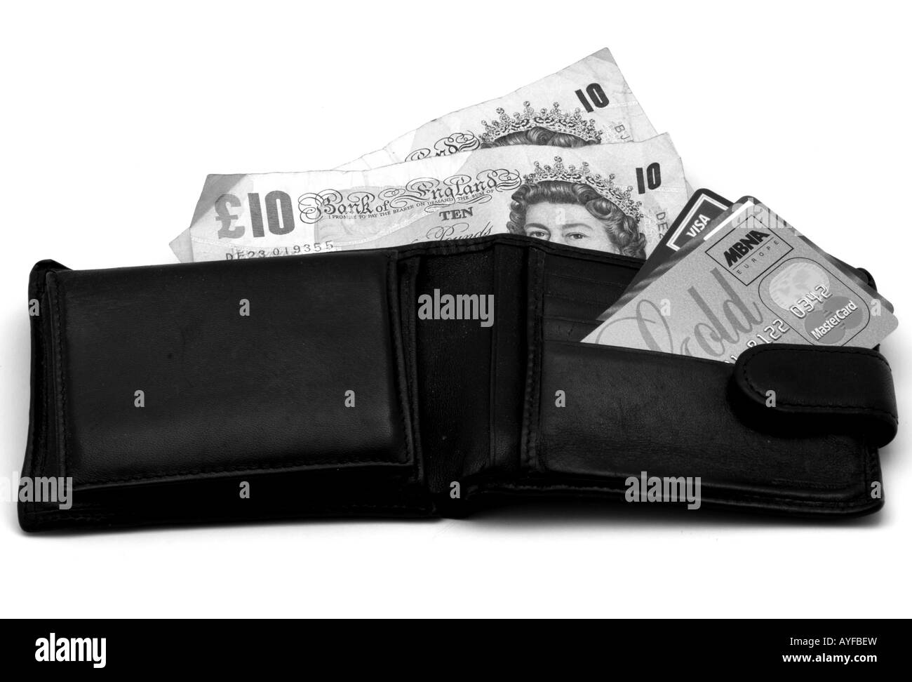 Il denaro di carte di credito in un portafoglio Foto Stock