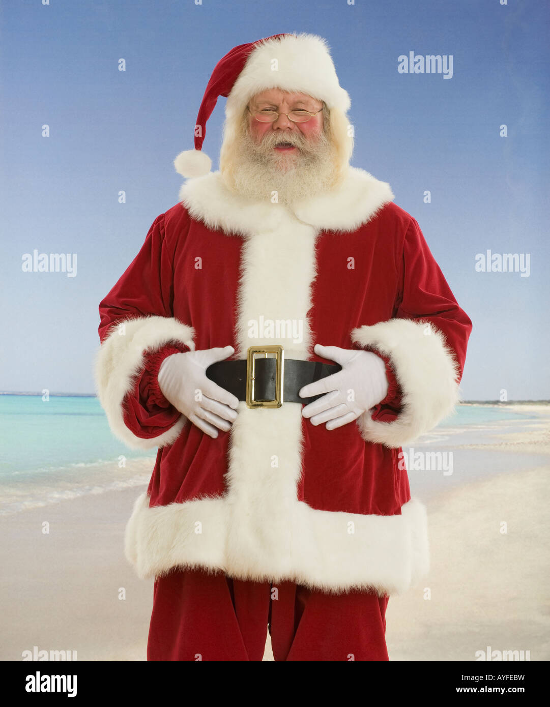 Babbo Natale a ridere a beach Foto Stock