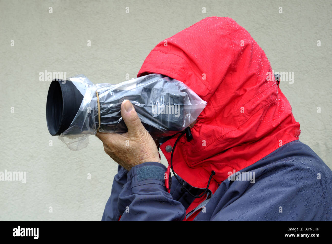 Fotografare sotto la pioggia Foto Stock