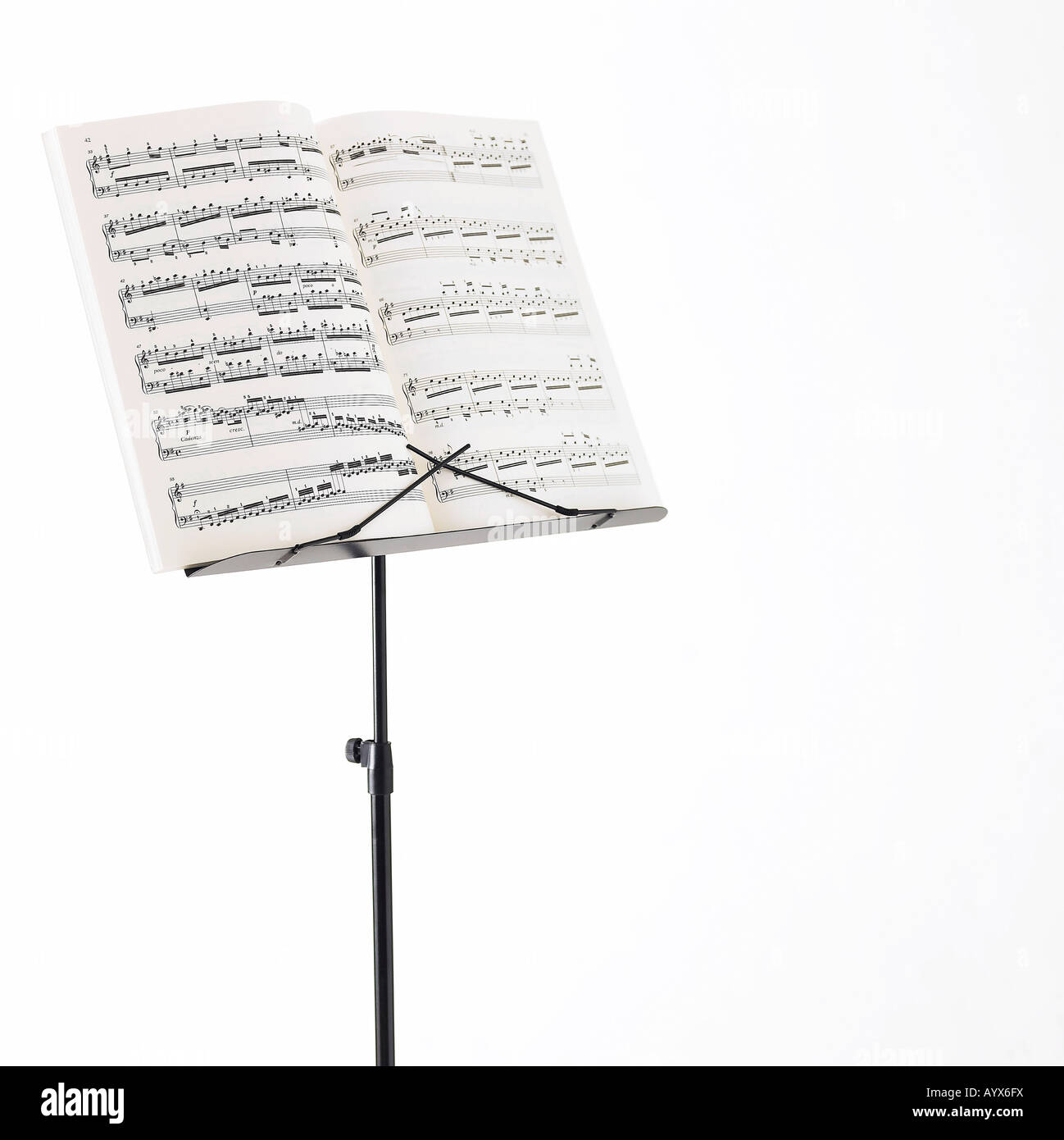 Un libro di musica e music stand Foto Stock