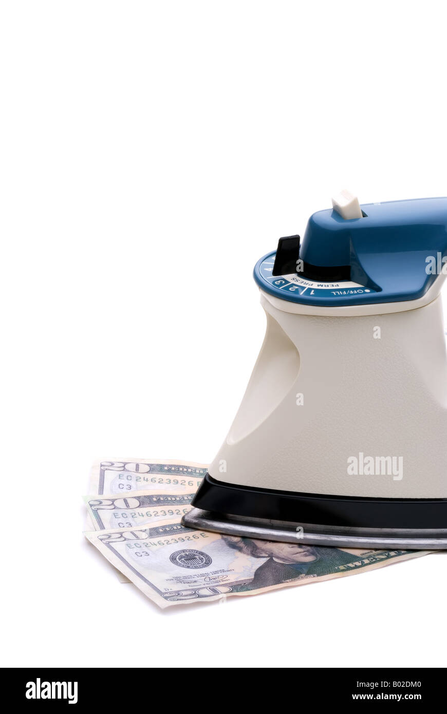 Il ferro sul denaro per indicare di stirare i economia o il riciclaggio di denaro Foto Stock