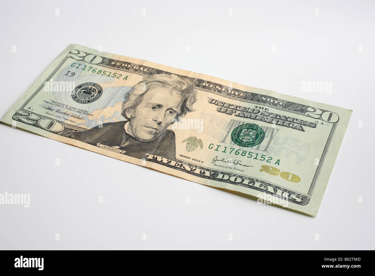 Primo piano della bolletta da venti dollari USA su sfondo bianco Foto Stock
