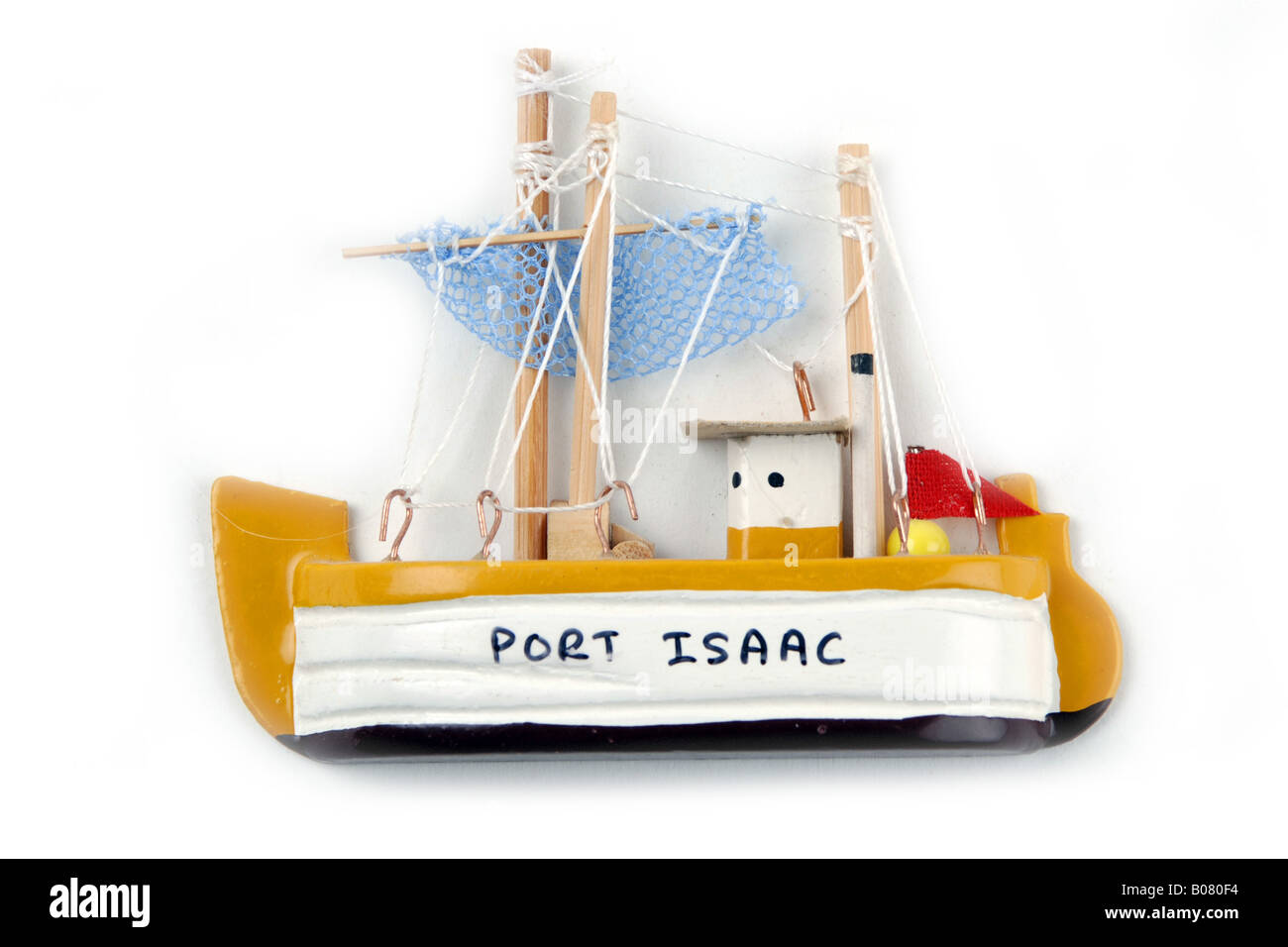 Piccola barca da pesca frigo magnete dono turistica da Port Isaac Cornovaglia Foto Stock