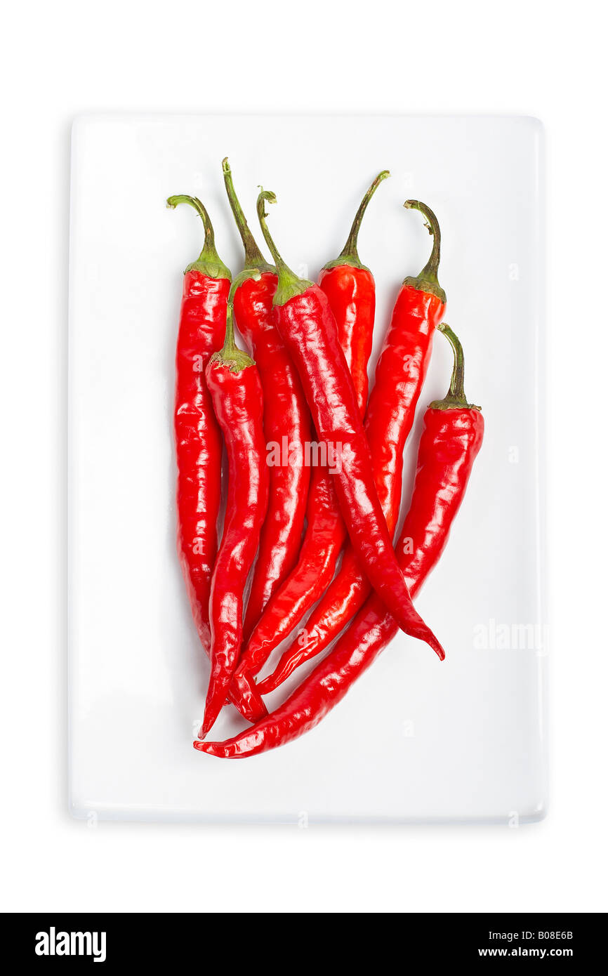 Red Hot Chili Peppers nella piastra con morbida ombra su sfondo bianco Foto Stock