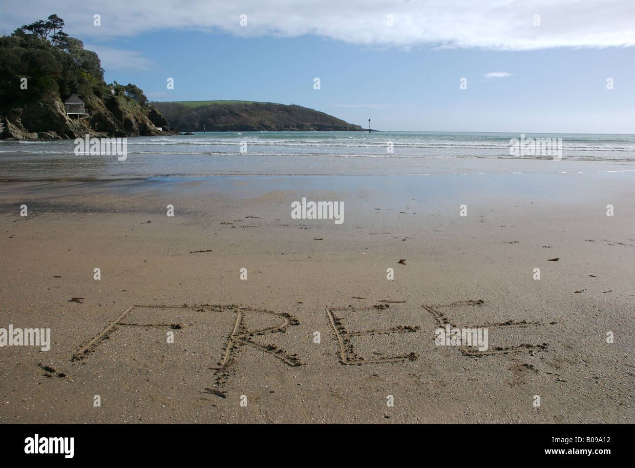 Libera parola nella sabbia sulla spiaggia, Salcombe, Devon, Regno Unito Foto Stock