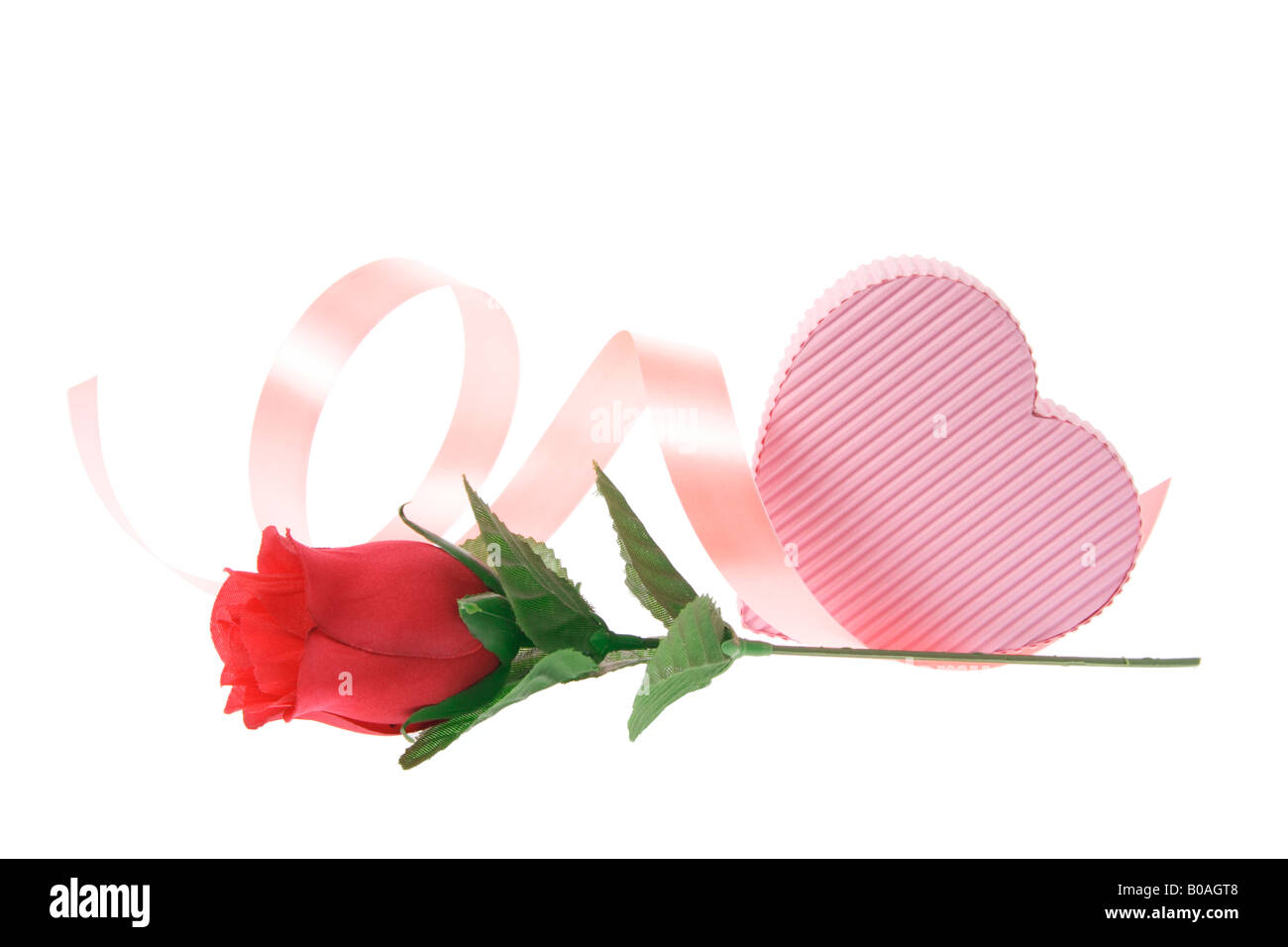 Confezione regalo e una rosa rossa Foto Stock