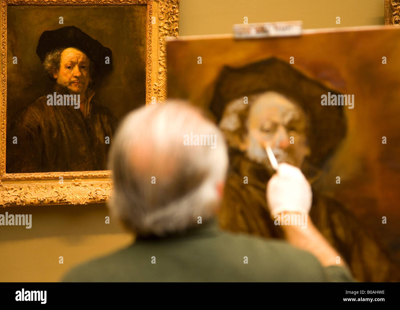 Metropolitan Art Museum e Art Gallery interior con il vecchio pittore maschio copiando un autoritratto di Rembrandt New York City NY Foto Stock