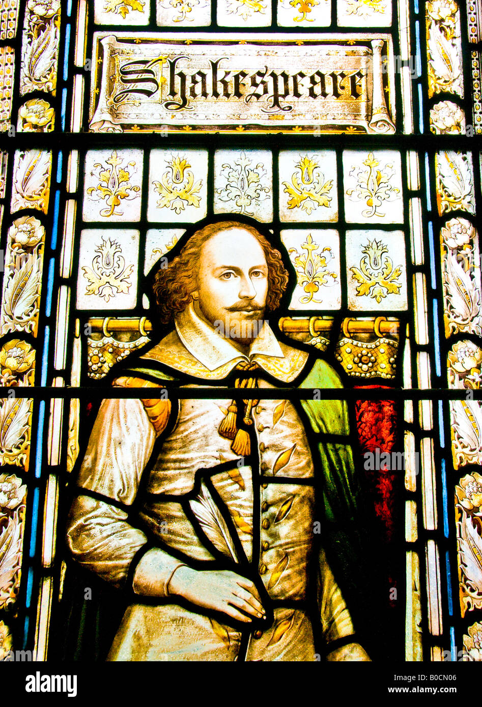 William Shakespeare rappresentata in una finestra di vetro colorato. Foto Stock