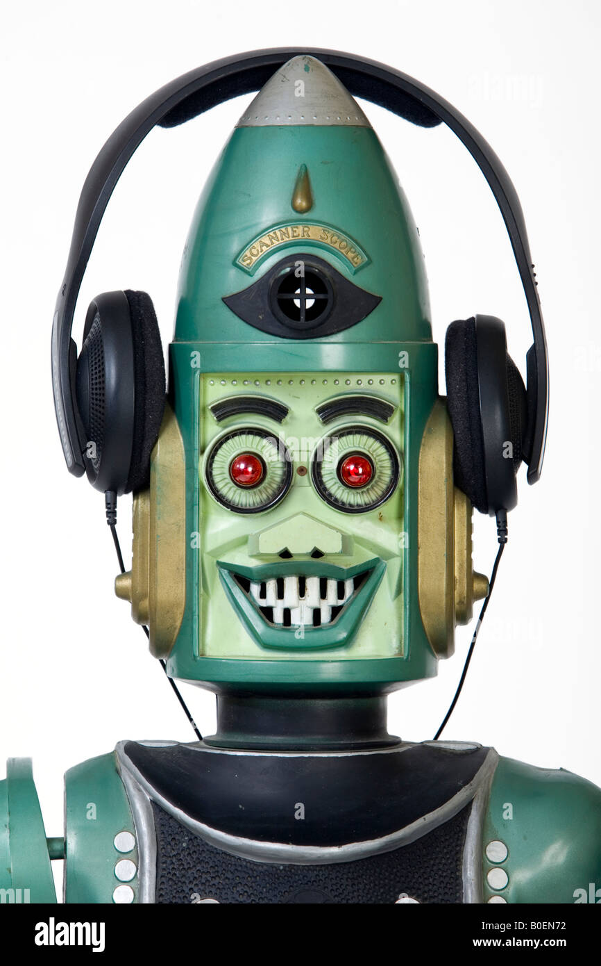 Un robot giocattolo di indossare le cuffie. Foto Stock