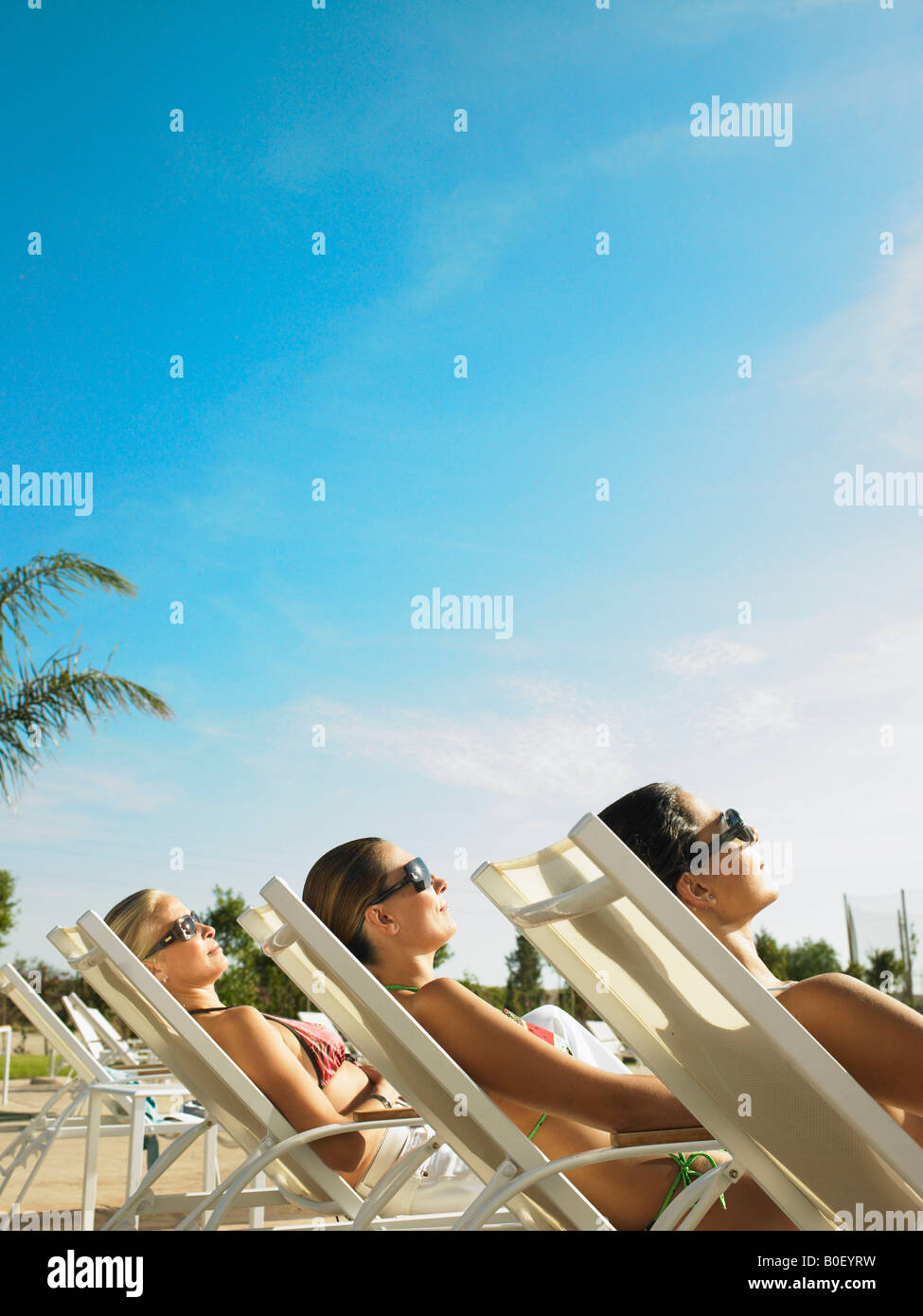 Tre Signori di relax al sole Foto Stock