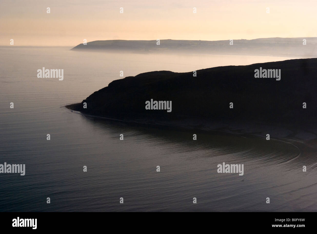 Costa del nord del Galles al tramonto Foto Stock