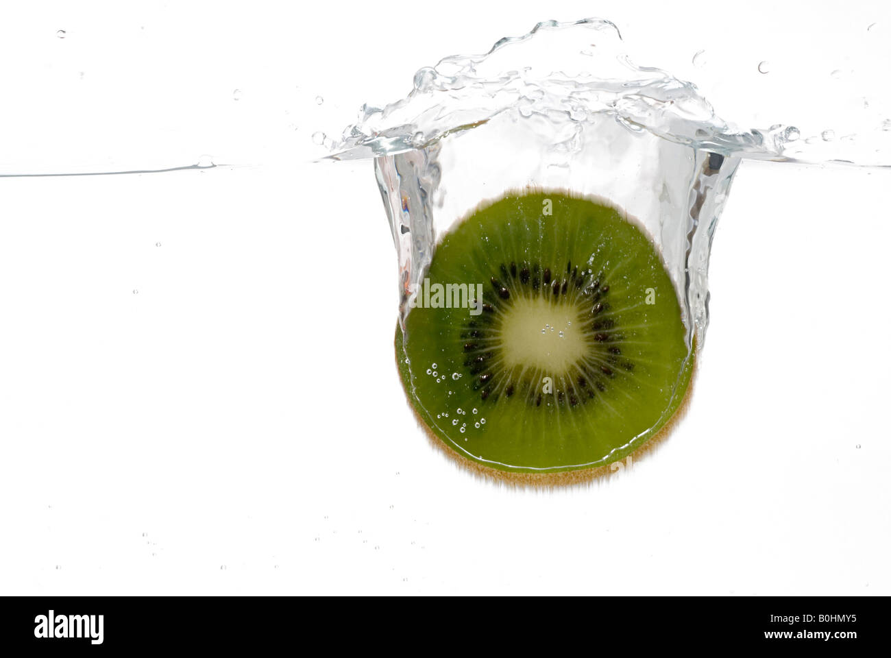 Kiwi cadere in acqua Foto Stock