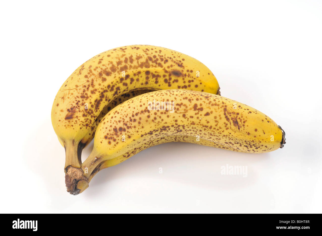 Due banane mature, macchie marroni Foto Stock