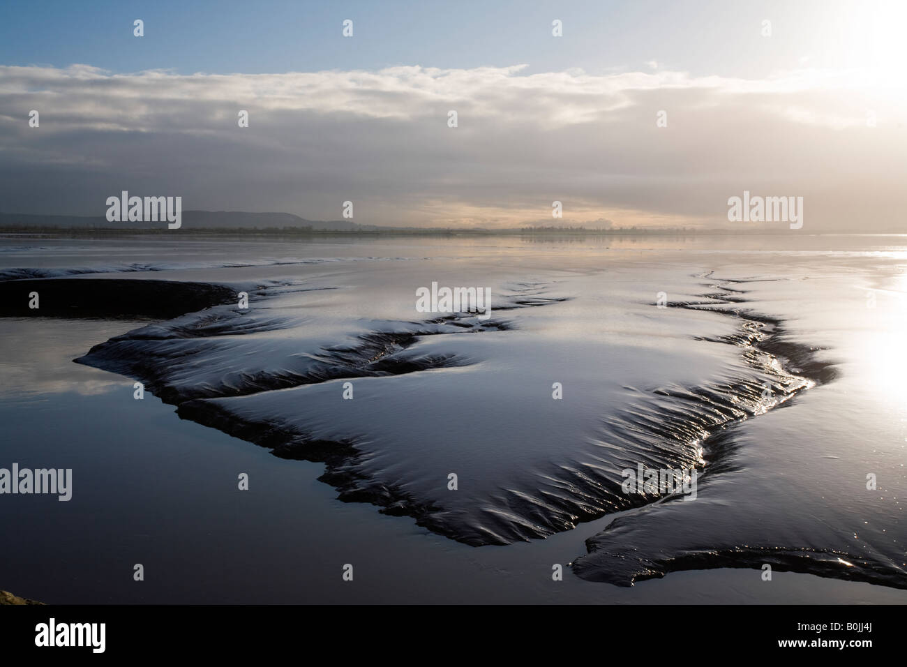 Appartamenti di fango a bassa marea sul fiume Severn, Gloucestershire, Inghilterra Foto Stock