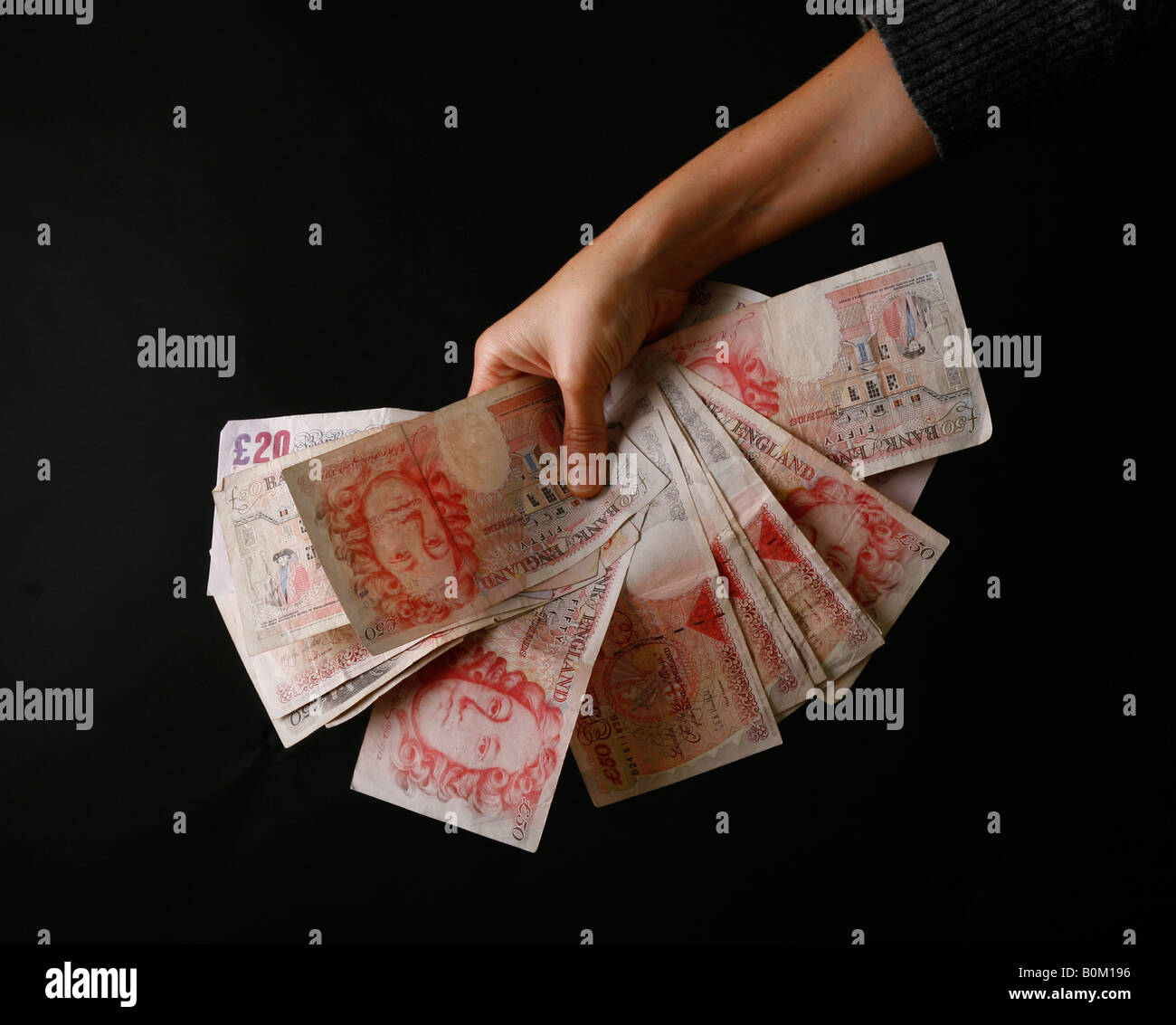 Contanti in mano, crisi bancaria, la crisi del settore bancario, credit crunch Foto Stock