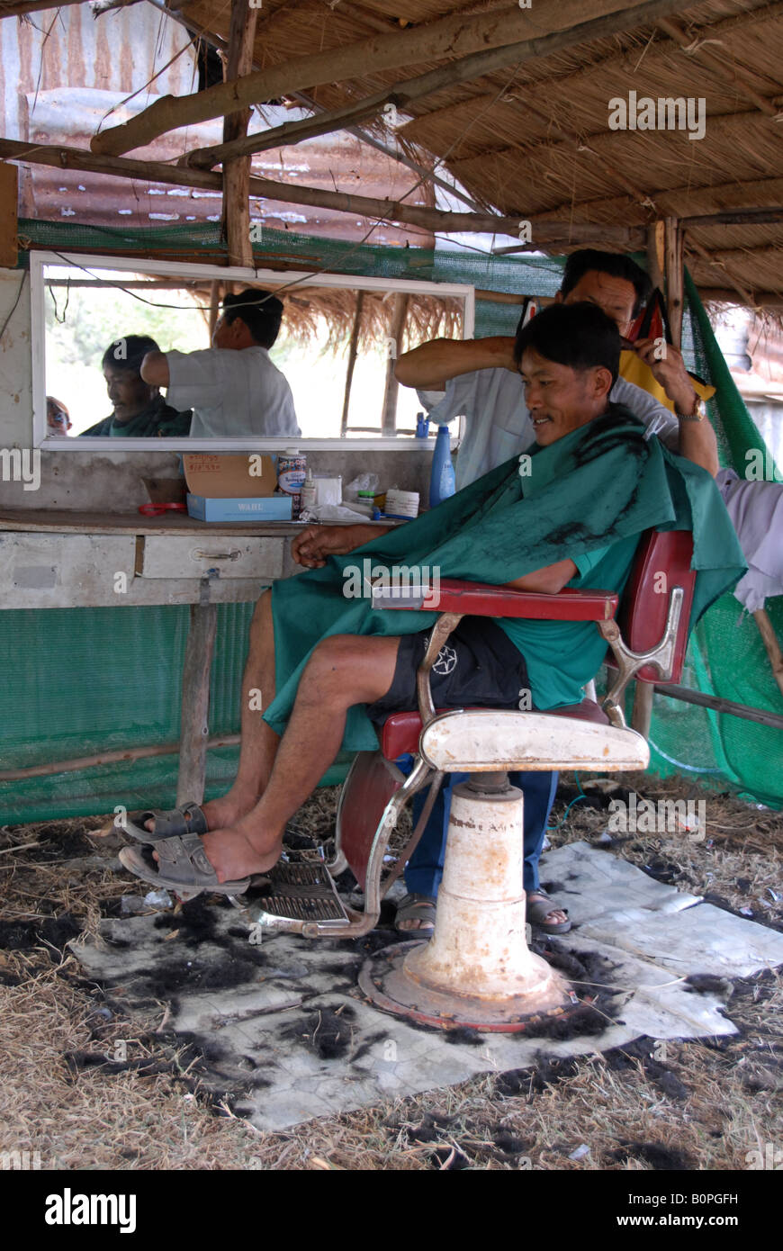 Outdoor barbiere nel nord-est della Thailandia Foto Stock