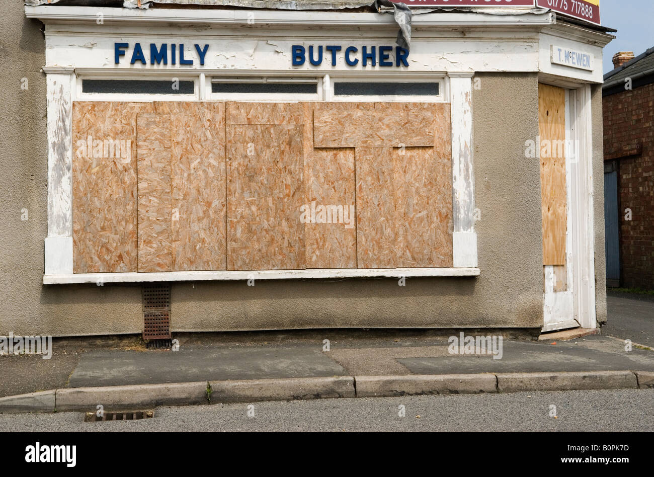 Family Butchers corner shop chiuso, Sutton Bridge Lincolnshire UK anni '2008 2000 HOMER SYKES Foto Stock