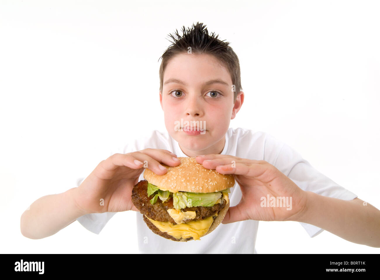 Hamburger di manzo beefburgers hamburger hamburger di marketing per bambini bambino fast food dieta indesiderata carne junkfood sandwich di mangiare un sn Foto Stock