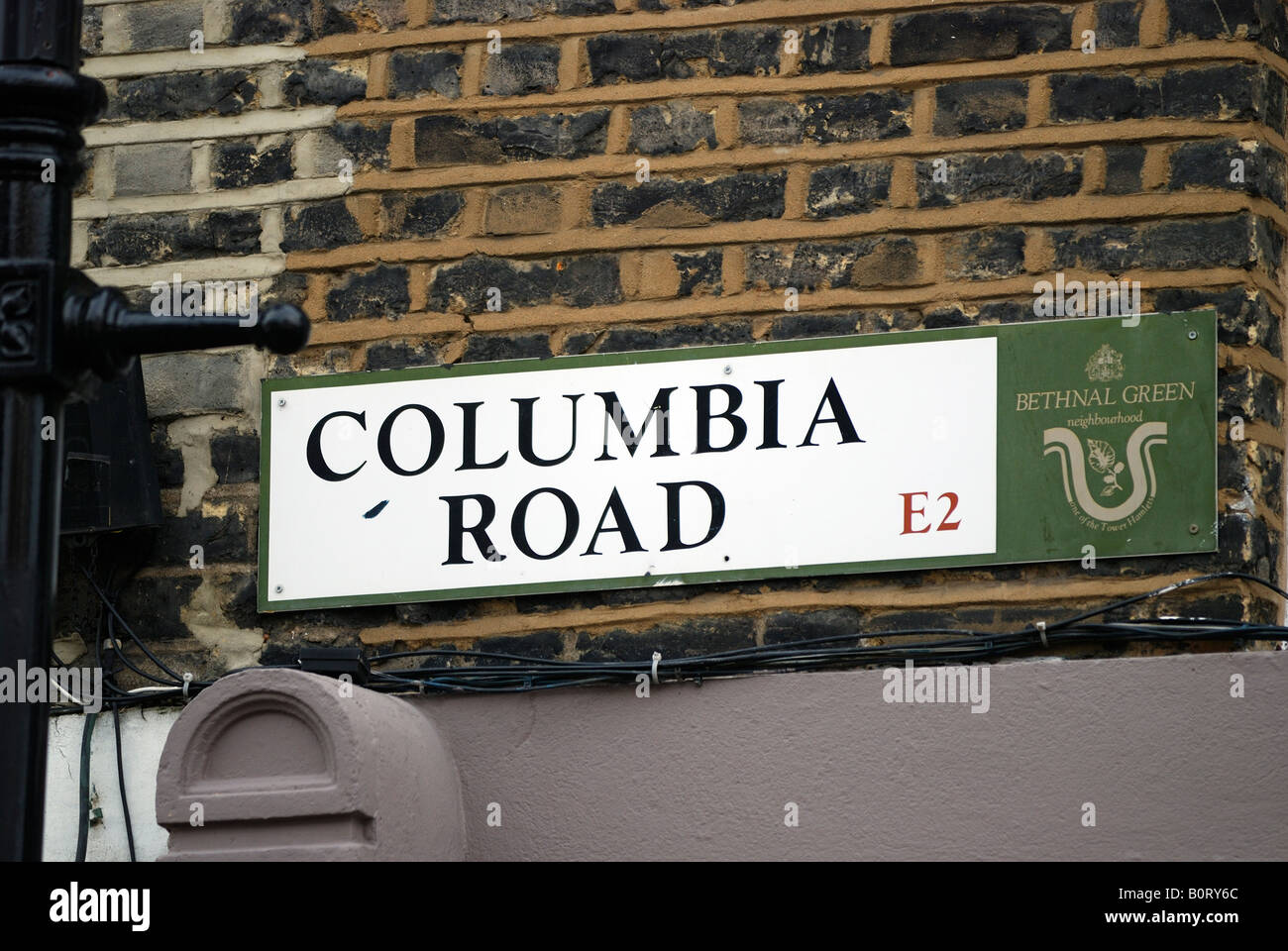 Strada segno su un muro di mattoni COLUMBIA ROAD MARKET EAST LONDON Foto Stock