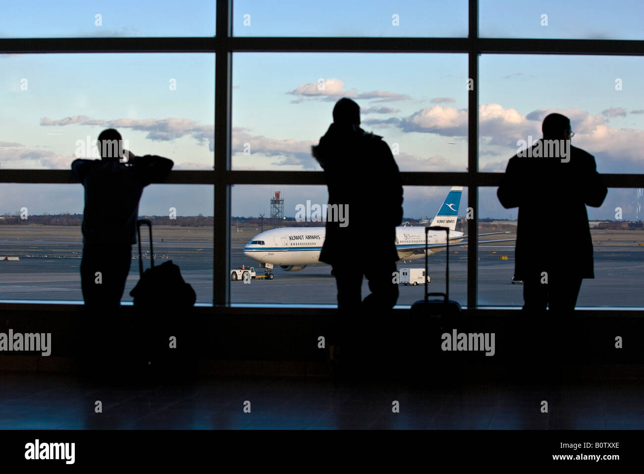 I passeggeri del trasporto aereo a Kennedy di New York City, Stati Uniti d'America Foto Stock