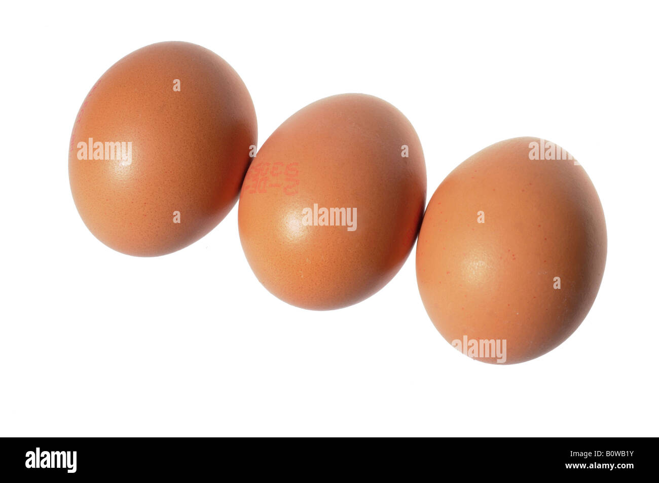 Tre uova, marrone Foto Stock