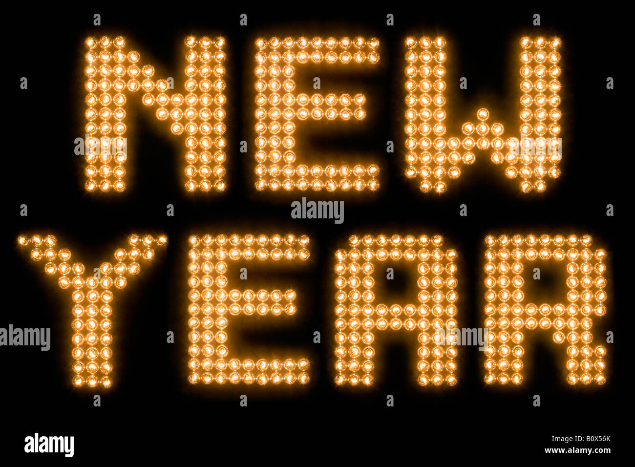 Le parole del nuovo anno illuminato di lampadine Foto Stock