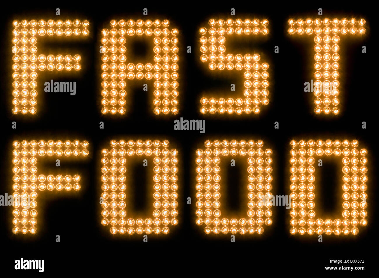Le parole di fast food illuminata di lampadine Foto Stock