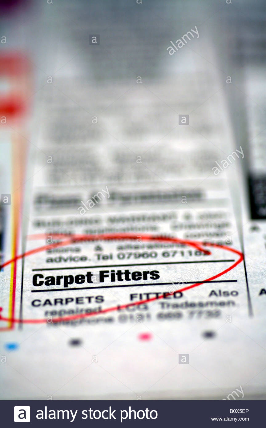 Tappeto installatori piccolo annuncio nel giornale annunci Foto Stock
