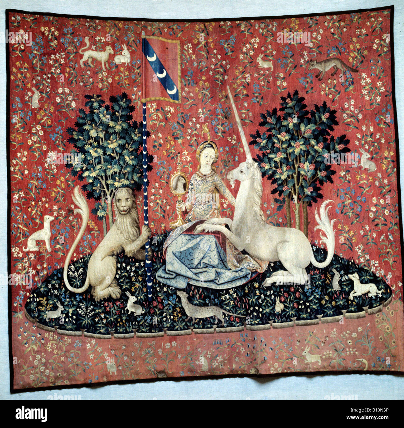 Lady e la tappezzeria di Unicorn, vista ,lion animali e fiori, fiammingo Foto Stock