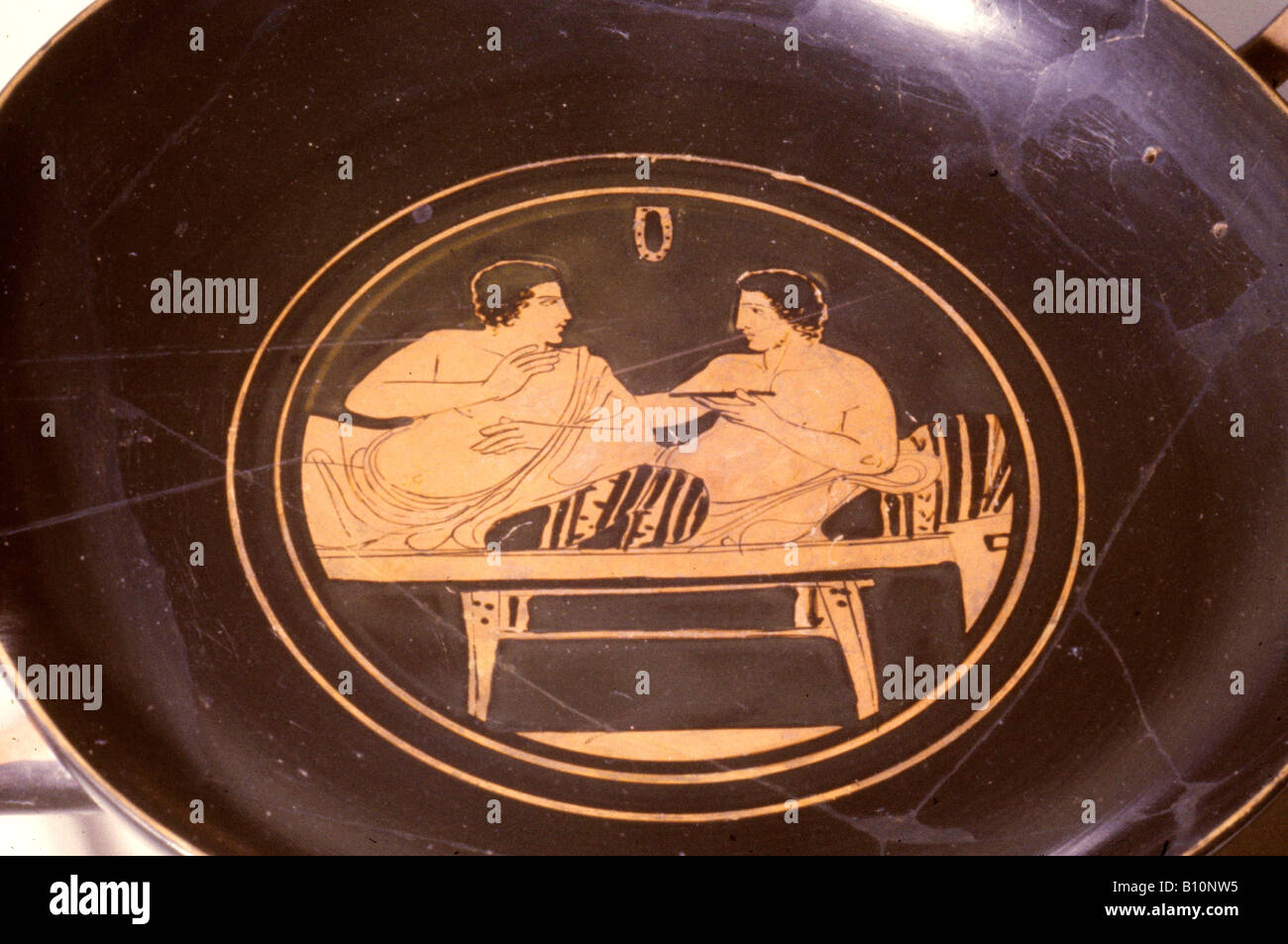 Simposio sulla scena kylix greco tazza del vino Foto Stock