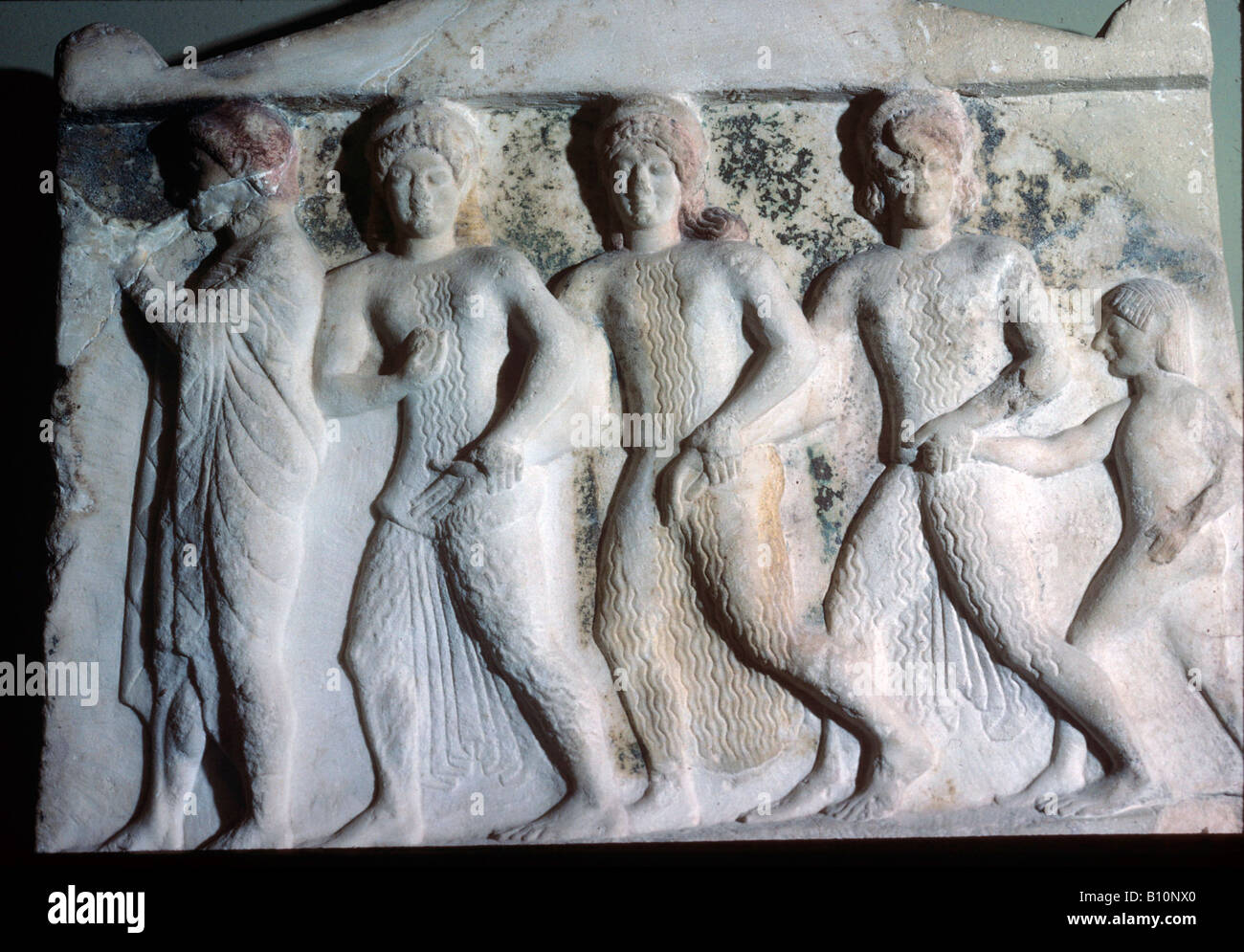 Hermes conduce la danza delle ninfe del VI secolo A.C. Rilievo greco Foto Stock