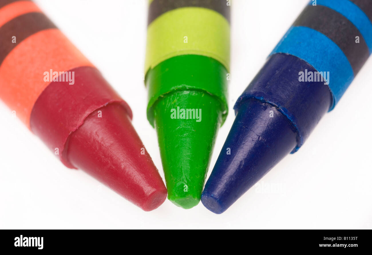 Pastelli in cera rossi, verdi e blu RGB su sfondo bianco Foto stock - Alamy