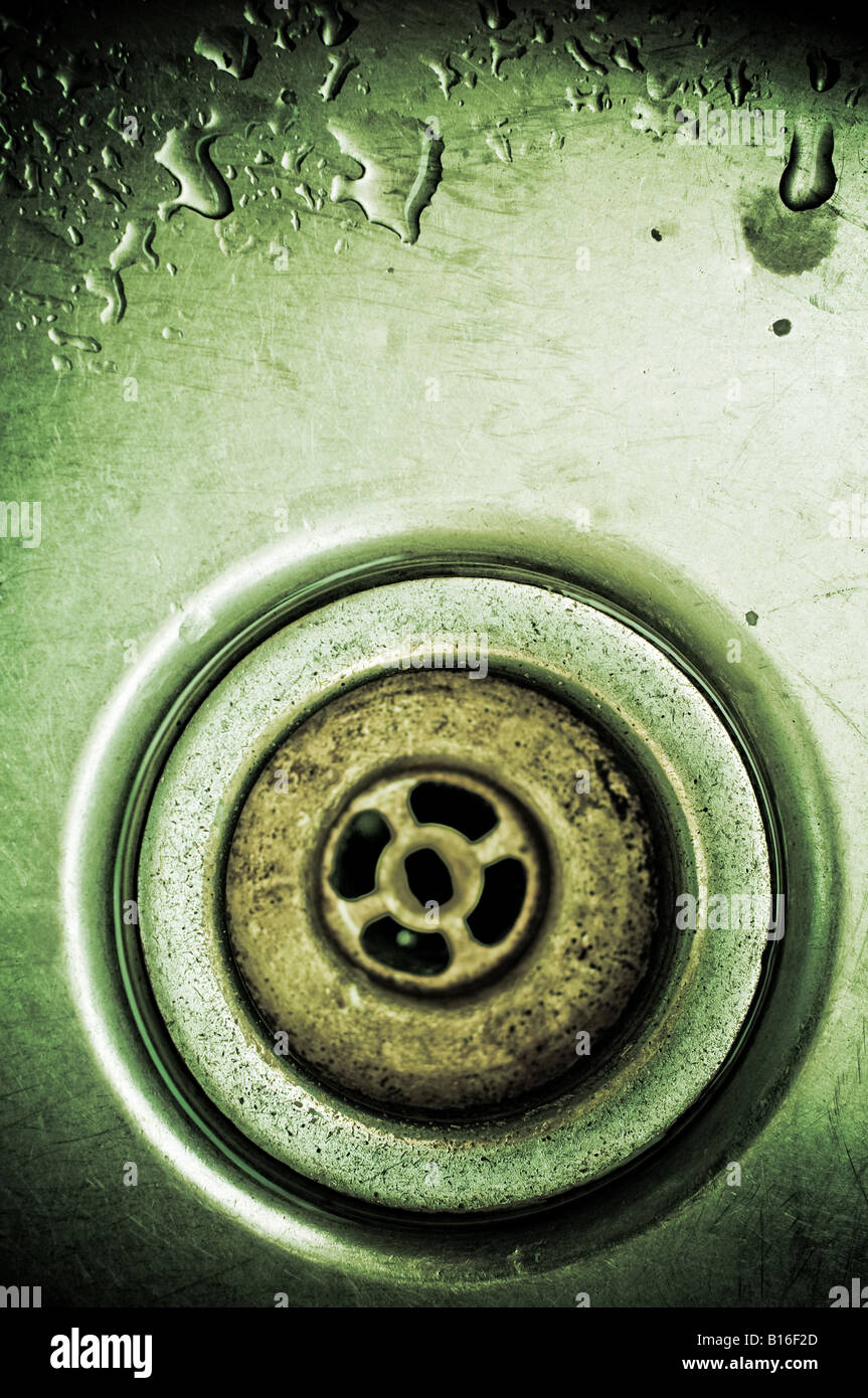 Cucina circolare Scarico lavello con acqua Foto Stock