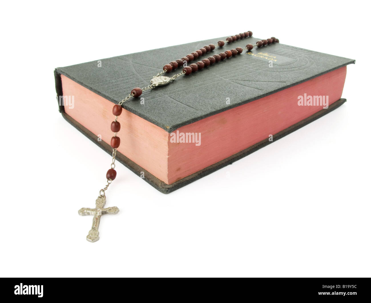 Rosario su un vecchio Santa Bibbia Foto Stock