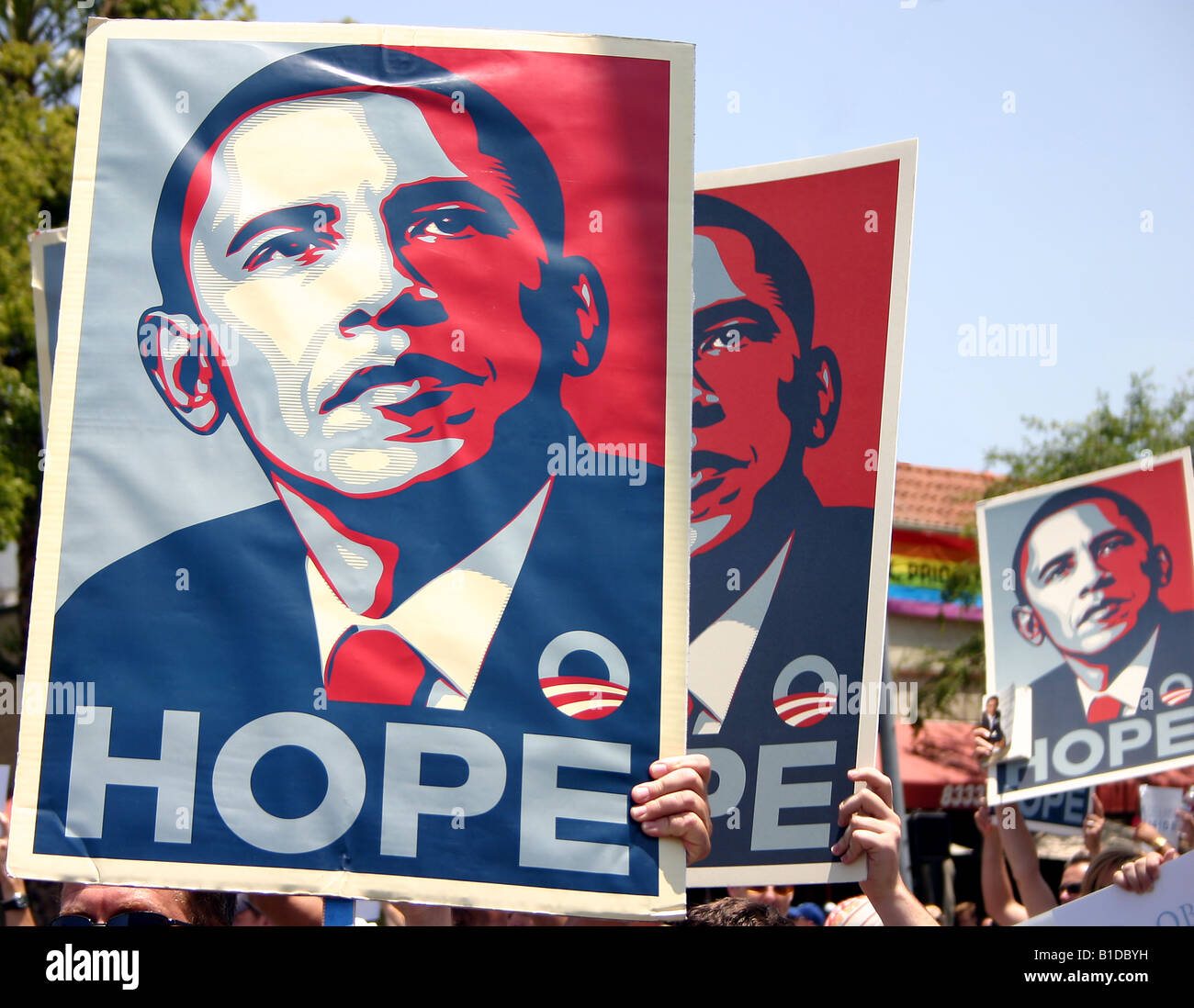I sostenitori di Obama marzo portando la speranza di poster Foto Stock