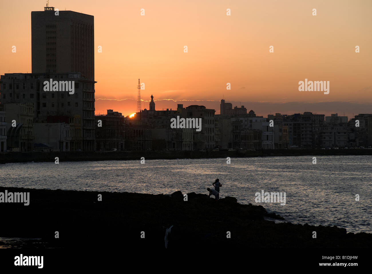 Tramonto sul Malecón, Havana Foto Stock