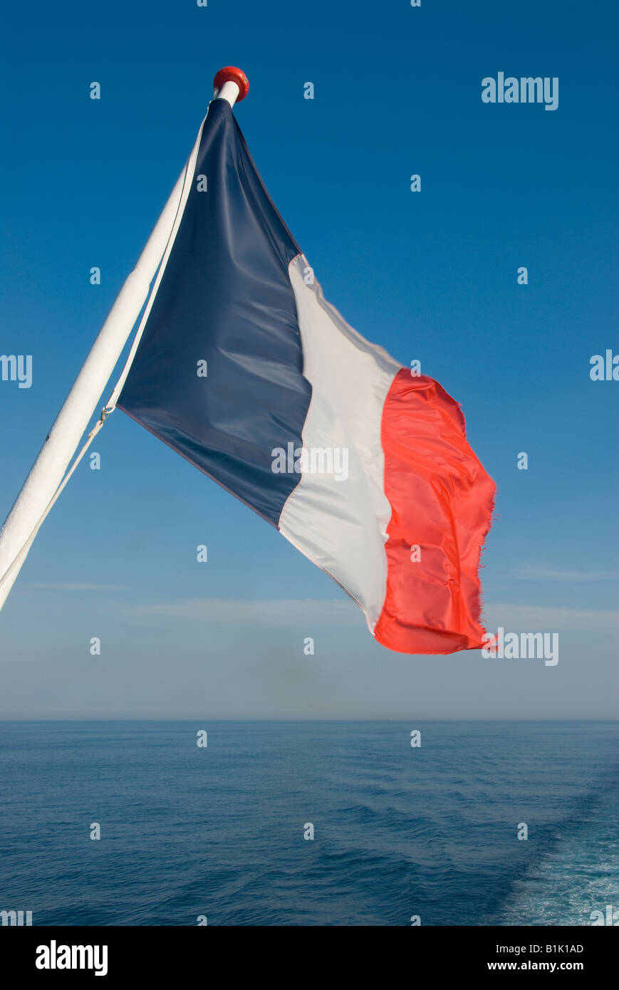 Bandiera francese e mare Francia Foto Stock