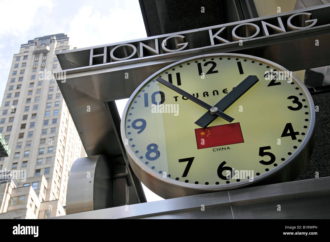 Orologio che mostra il tempo di Hong Kong, Cina, Manhattan, New York City, Stati Uniti d'America Foto Stock