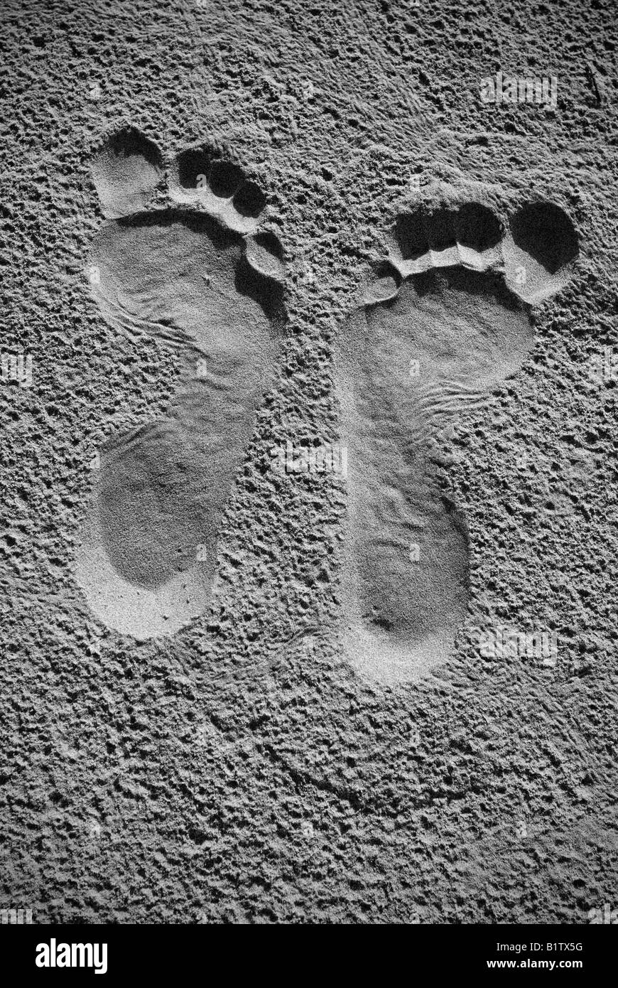 Impronta del piede sulla sabbia Foto Stock