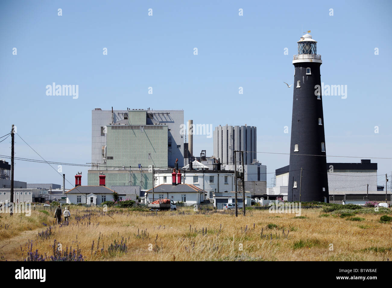 Dungeness centrale nucleare, nel Kent, con magnifiche faro. Foto Stock