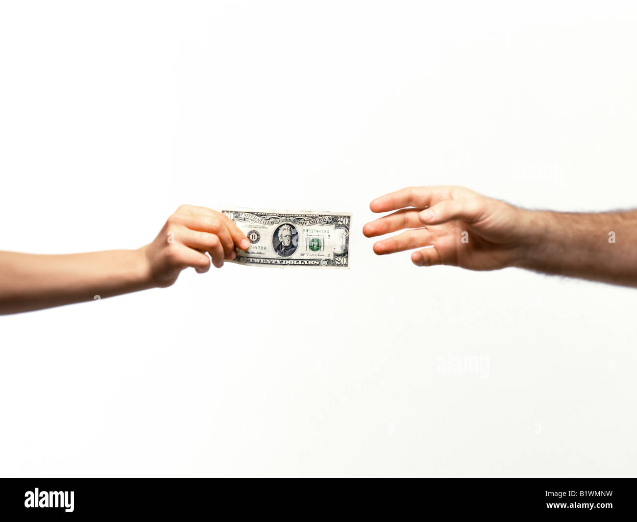 Lo scambio di denaro tra maschio e femmina Foto Stock