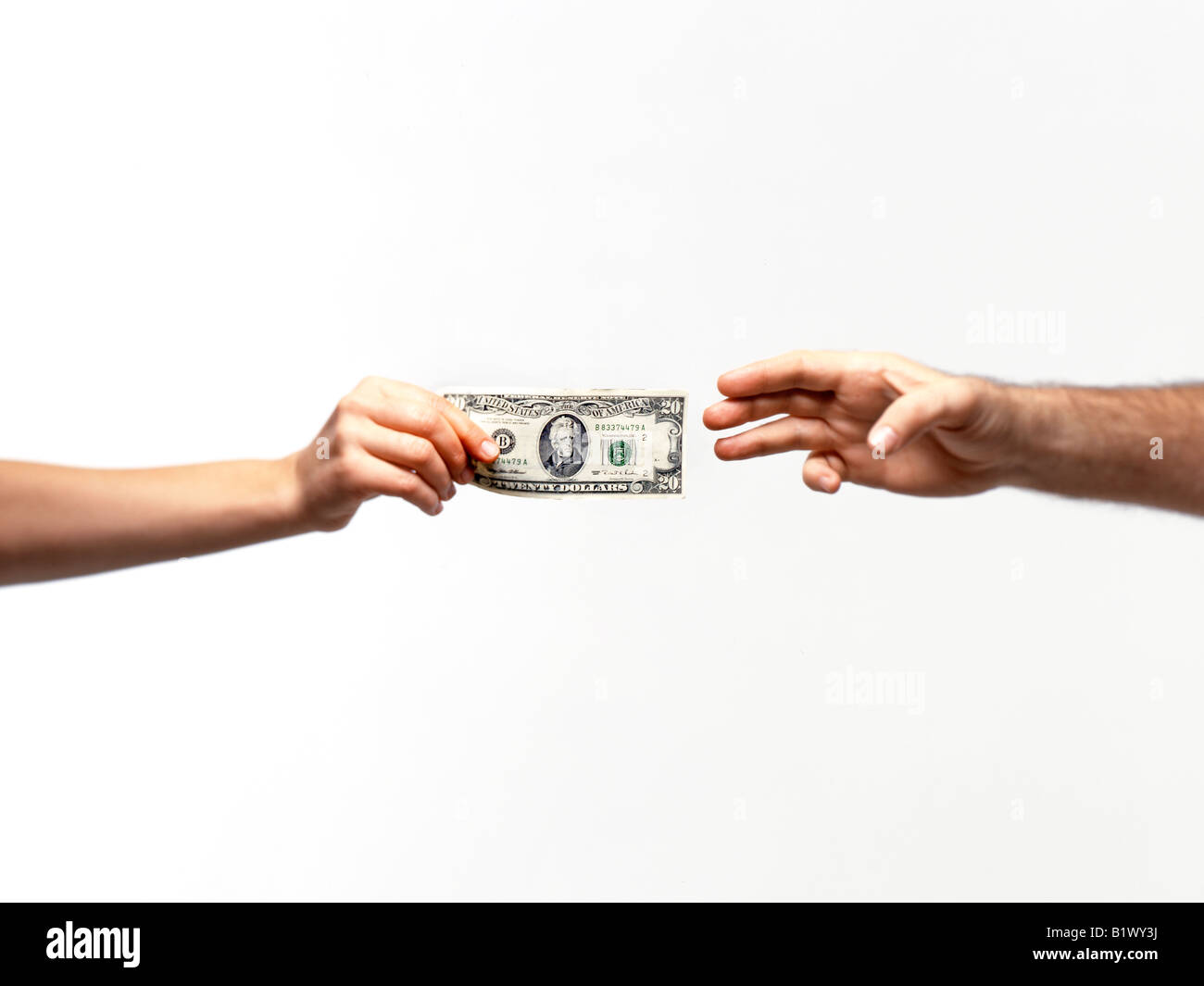 Lo scambio di denaro tra maschio e femmina Foto Stock