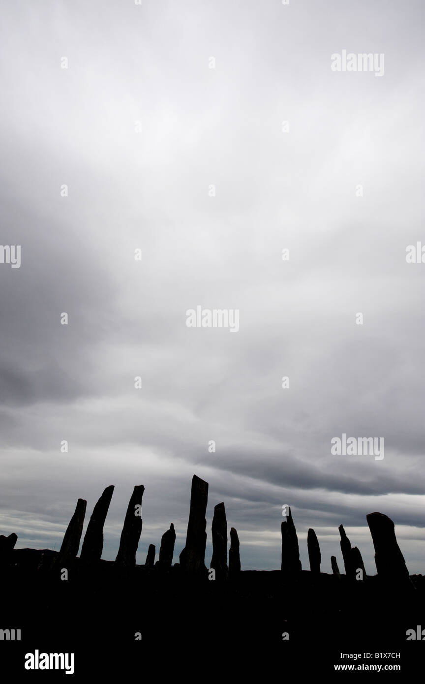 Silhouette di Callanish Standing Stones, isola di Lewis, Ebridi Esterne, Scozia Foto Stock