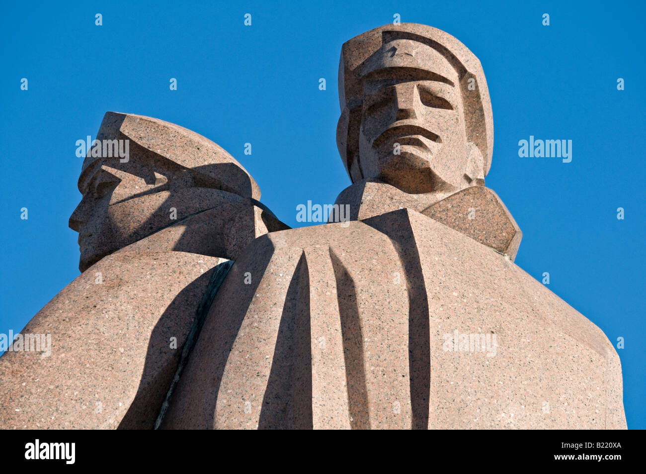 Il lettone fucilieri statua Riga, Lettonia Foto Stock