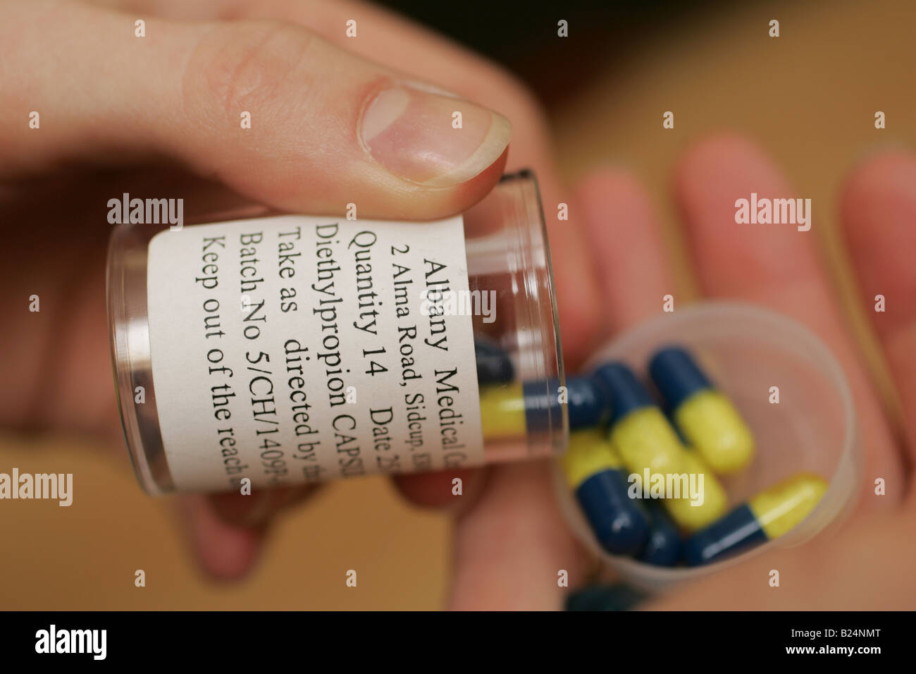 Dietilpropione cloridrato è una pillola di dieta usato per combattere l'obesità diminuendo il vostro appetito Foto Stock